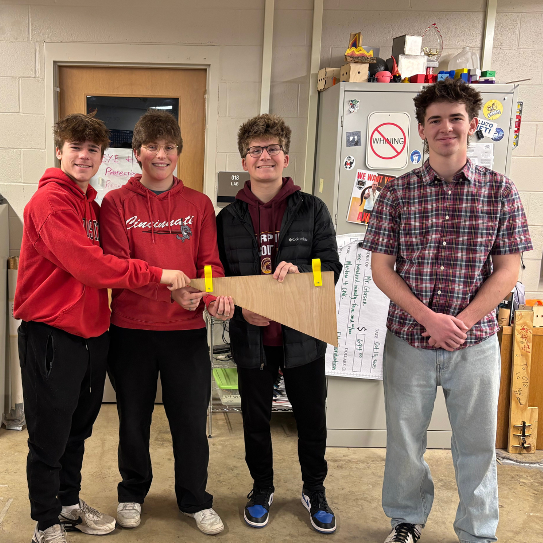 Turpin engineering students pose with their project